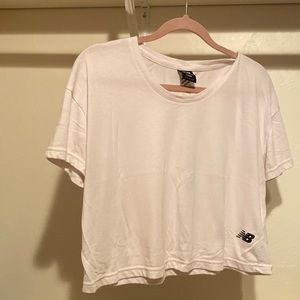 Cropped white New Balance workout shirt